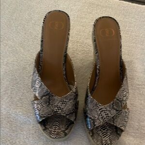 Kelsi Dagger Black and White Mules with Snakeskin Pattern